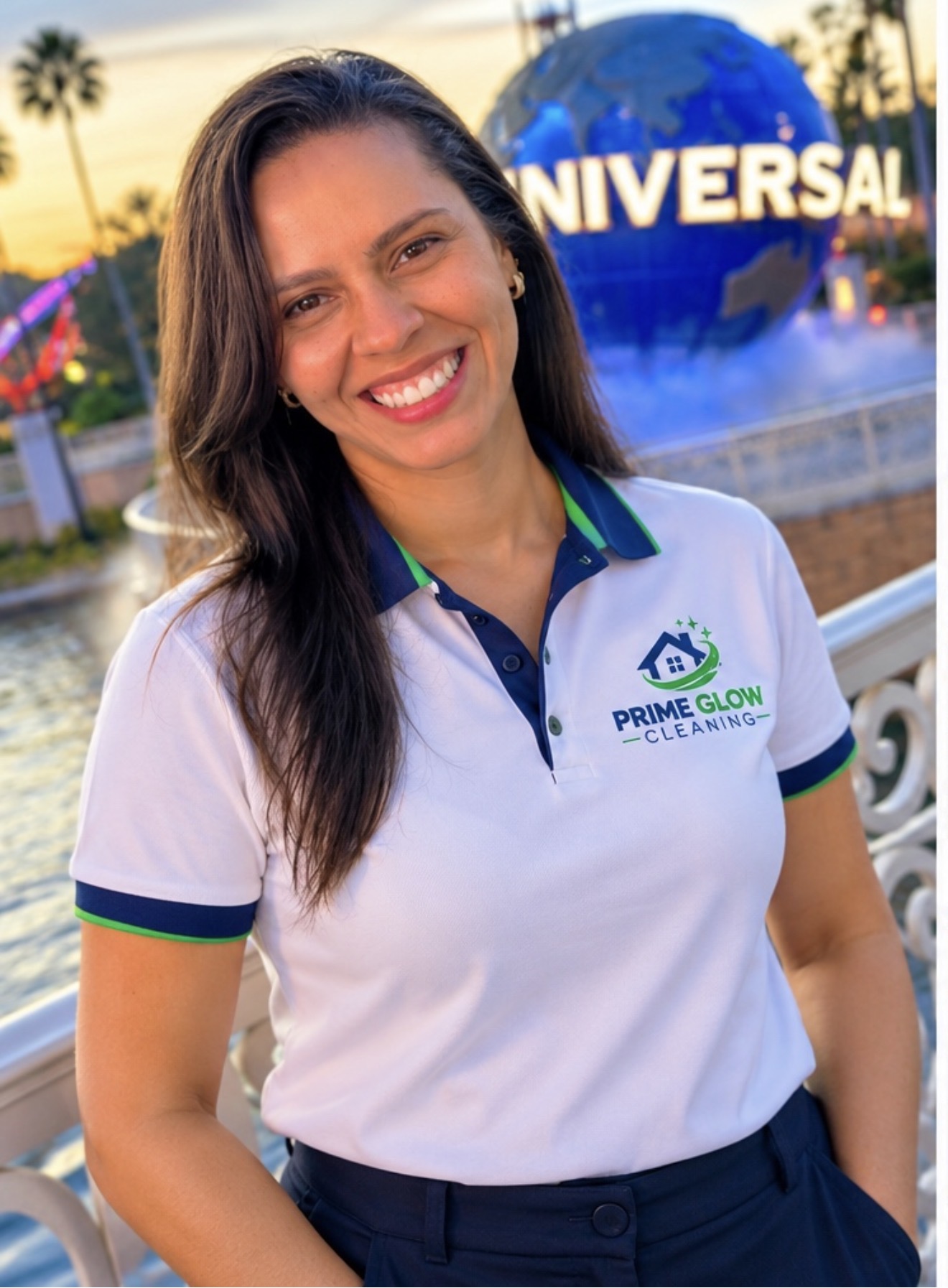 Prime Glow Cleaning founder smiling in her company polo